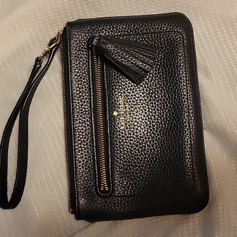 Kate Spade Black Pebbled Leather Wristlet with Metal Logo.